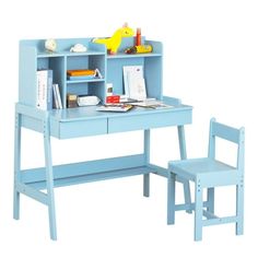 a toy desk and chair are shown in this image