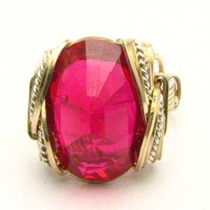 "Handmade Wire Wrap Two Tone Sterling Silver/14kt Gold Filled Man Made Ruby Ring 18x13mm (3/4x1/2 inch) 10+ct Sizing and shipping is ALWAYS FREE with a 14 day \"No Questions Asked\" return policy. lifetime warranty, free sizing and cleaning for life for life. All these are explained in the description below or feel free to reach out to us *In the notes section of your order, please specify ring size.* This ring is made with real gems. I made it myself, so if you see a setting you like and want a Oval Hand Wrapped Rings As A Gift, Oval Hand Wrapped Rings For Gift, Oval Wire Wrapped Rings As Gifts, Oval Wire Wrapped Rings For Gifts, Gold Man, Wire Jewelry Ideas, Wrapped Rings, Family Jewellery, Handmade Wire Wrapped