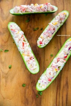 cucumber boats filled with coleslaw and sprinkles