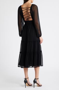 Bewitch the room in a chiffon dress set with sheer sleeves and an open back. 52" length Hidden side-zip closure Surplice V-neck Long sleeves with elastic cuffs Partially lined 100% polyester Dry clean or hand wash, dry flat Imported Black Chiffon Dress With Sheer Sleeves, Evening Dresses With Smocked Back In Chiffon, Chiffon Party Dress With Smocked Back, Party Chiffon Dresses With Smocked Back, Chiffon Day Dress With Smocked Back, Chiffon Dress With Smocked Back For Daywear, Fitted Chiffon Dress For Daywear, Elegant Chiffon Midi Dress With Smocked Back, Sheer Black Chiffon Dress