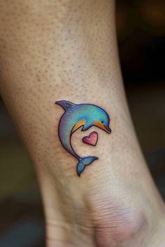 a small dolphin tattoo on the ankle