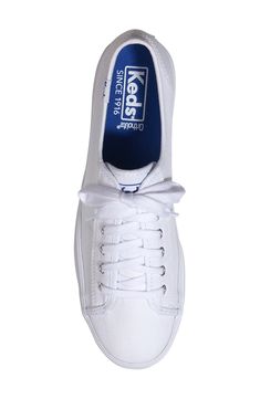 A cushiony platform gives you a boost in this versatile sneaker featuring a breathable canvas upper and a lightweight rubber sole. 1" platform Lace-up style Cushioned footbed Textile upper and lining/rubber sole Imported Keds Triple Kick, Platform Sneaker, White Canvas, Keds, Up Styles, Womens Sneakers, Rubber Sole, Size 7, Nordstrom