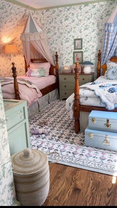 a bedroom with two beds and suitcases on the floor