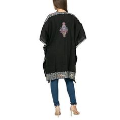 Raj Amira Thick Stitch Embroidered Duster Kimono This beautiful, embroidered Duster Kimono elegantly elevates your style. The relaxed body is comfortable for all body types. Style this contemporary and versatile kimono with your favorite denims, dresses and shorts with heels or boots.        Only Open Front, Loose Fit, Print- Paisley      One Size fits most (2-16)      Material: 100% Rayon      Care: Dry Clean      Colors: Black with Red, Black with Gold, Black with White      Imported Summer Festive Embroidered Kimono, Bohemian Chikankari Embroidered Fabric, Summer Chikankari Embroidered Fabric, Summer Chikankari Embroidery Fabric, Black Top With Intricate Embroidery, Embroidered Long Kimono For Eid, Embroidered Kaftan For Fall Festival, Black Resham Embroidered Fabric, Festival Embroidered Kimono