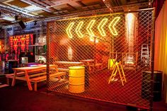 the interior of a restaurant with neon lights