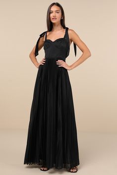 Capture the attention of any cutie in the room with a charming number like the Lulus Attentive Elegance Black Tie-Strap Bustier Pleated Maxi Dress! Lightweight woven fabric (with a subtle sheen throughout) shapes this sweet gown that features a bustier-inspired bodice with seamed cups and a sweetheart neckline, all supported by long tying straps. The high, fitted waist tops a flowy, pleated A-line skirt that gracefully falls to a sweeping maxi hem. Hidden back zipper/clasp. Fit: This garment fit Black Skirt And Top, Black Sweetheart Dress, Knot Tie Dress, Dress With Tie Straps, Fall Wedding Guest Dress, Sweetheart Dress, Pleated Maxi Dress, Pleated Maxi, Dress With Tie