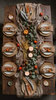 an overhead view of a table set for thanksgiving dinner