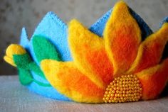 a close up of a colorful crown on a table