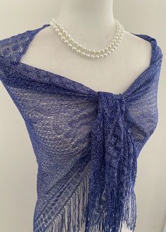 This versatile shimmery shiny shawl with fringe can be used to dress up an outfit for a special evening, a wedding or as a neck scarf in spring. Effortlessly give a dress a new look by simply adding this shawl. Perfect as bridesmaid gifts or wedding favours, the perfect gift for any occasion. This is not a very large shawl. There is metallic thread woven in the shawl that gives shining shimmery look.  Measures 20"Wx 75" The colours are very close however not exact. I tried to to capture the color but was not able to get the exact color under any lighting. If you are trying to match something and would like more pictures, I will be happy to send you more pictures. WASHING INSTRUCTIONS Dry clean or hand wash in cold gentle soapy water, flat dry and iron over cloth. Thank you for stopping by Triangle Scarf, Neck Scarf, Sheer Chiffon, Soapy Water, Metallic Thread, Neck Scarves, Wedding Favours, Different Fabrics, Shawls And Wraps