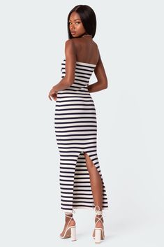 Maxi dress Strapless fit Back slit Striped pattern Knit fabric Polyester, Rayon, Spandex Model wears size S Model height is 5'9 Item care: Wash with similar color Stripe Dress Outfit, Maxi Dress Strapless, Rib Sweater, Girls Maxi Dresses, Rib Stitch, Dress Knit, Ribbed Sweater Dress, Stripped Dress, Swimwear Dress