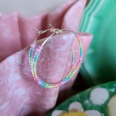 Handmade pastel ombre rainbow beaded wire hoop earrings. Minimalist style but still colorful! Wear them to show your pride or allyship, or just because you like the colors. 🌈 Notes about this item: *24-karat gold-plated wire hoops *Beaded with tiny seed beads in an ombre progression of rainbow shades. These are clear beads with color inside, so light passes through them and gives the appearance of sort of a glow. Notes about my items in general: *All hardware nickel-free and lead-free *Measurem Lgbtq Ally, Pastel Ombre, Wire Hoop Earrings, Dreamy Aesthetic, Clear Beads, Rainbow Beads, Ombre Color, Earrings Minimalist, Pride Month