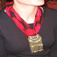 This Afghanistan tribal earring on the red and black chiffon scarf has a new life as a necklace.  The earring itself measures 4.5"inches long and the scarf is 25"inches long on each side.  The length can be easily adjusted and can be worn tied around the neck with the earring hanging down the front or even down the back... Which ever way you wear this necklace, it will certainly brighten up your day and when not being worn, it certainly would liven up your decor if you hanged it over a simple va Traditional Red Scarves As Gift, Traditional Red Scarves For Gifts, Red Bohemian Scarf As Gift, Red Bohemian Scarves For Festivals, Bohemian Red Scarves For Festivals, Silk Route, Chiffon Scarf, Earring Necklace, Jewelry Necklace Pendant