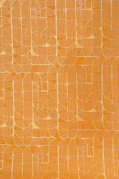 an orange and white abstract pattern with wavy lines on it's surface, as well as the letter e