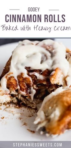 cinnamon rolls on a plate with icing drizzled over them and the words gooey cinnamon rolls baked with fresh cream