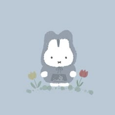 a cartoon bunny sitting in the grass with tulips