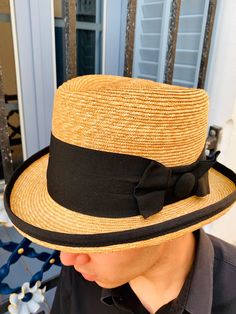 Homburg straw hat inspired by the Edwardian-era men's hats of the early 20th century. This hat is one of my favorites for summer for its elegance and personality. It is a unique and exclusive design made with one of my wooden hatblocks from my collection. Made with very fine 6/7 millimeter natural straw braid. The hat is adorned with a 70mm wide black grosgrain ribbon and another small 25mm grosgrain at the end of the hat brim. You have the option to change the color of the grosgrain by choosing High Crown Toquilla Straw Hat For Summer, Toquilla Straw High Crown Hat For Summer, Formal Straw Boater Hat With Curved Brim, Summer Straw Hat With High Crown, Summer High Crown Straw Hat, Natural High Crown Straw Hat For Summer, Classic High Crown Straw Hat For The Beach, Classic High Crown Boater Hat For Summer, Classic Brown Straw Boater Hat