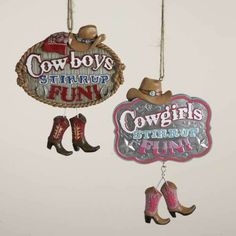 two cowboy themed signs hanging from strings on the wall next to boots and cowgirl's boot