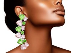 Indulge in luxury with our Dangle Pink Green Heart Crystal Earrings, designed for Alpha Kappa Alpha women. These stunning earrings feature a delicate pink and green heart-shaped crystal, symbolizing love and growth. Elevate your style and show your sorority pride with this exclusive and tasteful accessory.

Women's Dangle Stud Earrings Silver Metal with Pink or Green Heart and Radiant Cut Shaped Crystals Featuring Linked Angle Drop Design. Post Backing. 3.25 x 1". #alphakappaalpha #sorority #sororitymerch #hbcu #hbcugrad #hbcuhomecoming Alpha Female, Alpha Kappa Alpha, Sorority Gifts, Sorority Life, Radiant Cut, Stunning Earrings, Drops Design, Silver Earrings Studs, Sorority