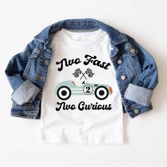 a white t - shirt with a blue jean jacket on it that says, no fast two curiouss