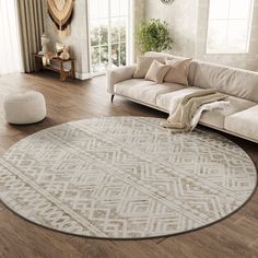 a living room with a large rug on the floor