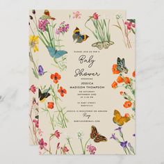 an image of a wedding card with butterflies and flowers on the front, which reads baby shower