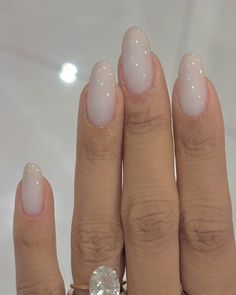 From icy sheer polishes to pearlescent chrome nails, these are the classy manicures to consider for your January nails, particularly if you have a hangover from red Christmas nails. These winter manicures are the perfect cool toned antidote to your December nails, or if you're looking for very last minute NYE party nail art.