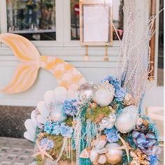 an arrangement of seashells, pearls and other decorations