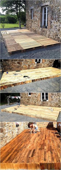 the process of building a wooden deck for an outdoor area with stone walls and windows