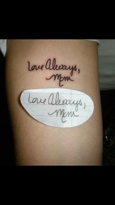 a woman's thigh with the words love alwayss me written in cursive writing