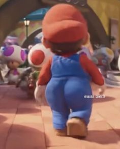 an animated character is walking down the sidewalk in front of other characters and toys behind him