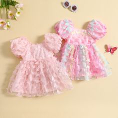 A stunning butterfly dress for your little princess! It has darling little butterfly applications all over and adorable puffed sleeves for a fairytale look your little girl is going to adore. Whimsical Princess Dress With Ruffles For Dress-up, Cute Puff Sleeve Dress With Ruffles For Party, Sweet Short Sleeve Princess Dress For Dress-up, Cute Puff Sleeve Party Dress, Pink Fairycore Puff Sleeve Dress, Pink Puff Sleeve Fairycore Dress, Cute Puff Sleeve Dress For Party, Cute Puff Sleeve Short Dress For Party, Cute Short Sleeve Princess Dress For Spring