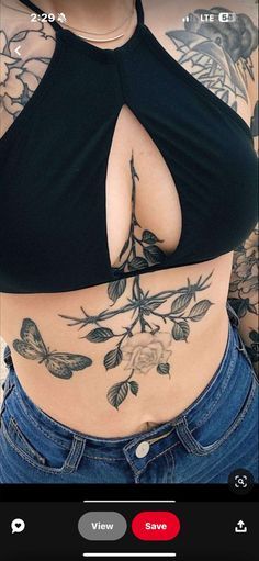 an image of a woman with tattoos on her stomach and the bottom half of her body