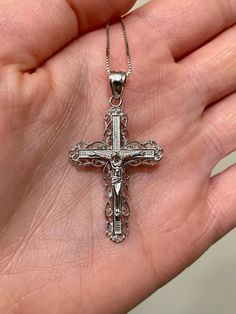 14k beautiful and unique, vine, design, White Gold, Crucifix Pendant. Material: 14k solid white gold. Length: 1.5 Inches. With bail 1.75 inches. Weight: Approximately 3.3 grams. Comes in a nice box. *Chain is sold separately and available at check out. Chain is typically 1.5-3 grams depending on length chosen.* Classic Engraved Crucifix Necklace, Elegant Tarnish-resistant Crucifix Necklace, Diamond-cut Crucifix Necklace, Gold-plated Tarnish-resistant Crucifix Necklace, Diamond-cut Cubic Zirconia Crucifix Necklace, Vine Design, Rope Chain, Quality Jewelry, Vines