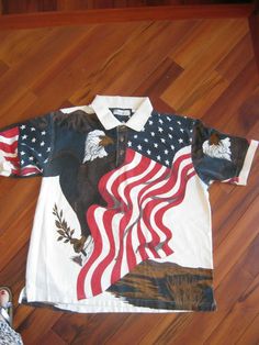 Great shirt, XL American Summer polo shirt. Eagle and the American flag. American Flag Clothes, Stars Graphic, Eagle Flag, American Summer, Summer Clothing, Clothing Co, Mens Polo Shirts, American Flag, Men's Polo Shirt