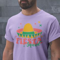 🎉 Get ready to party in style with the "Fiesta Squad" Cinco de Mayo shirt from Digital Brody! 🎉 Celebrate in comfort with this high-quality shirt made of medium fabric (5.3 oz/yd²) crafted from 100% sustainable and durable cotton. The classic fit ensures a relaxed and comfy wear, while the stylish crew neckline adds a neat, timeless touch that's perfect for any occasion, from casual gatherings to semi-formal fiestas. But wait, there's more! This shirt features a tear-away label for a scratch-f Cheap Spring Party T-shirt, Cinco De Mayo Celebration, Comfy Wear, Squad Shirt, Festival Shirts, Graphic Shirt, Graphic Shirts, San Jose, In Style