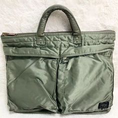 Porter Yoshida Tanker Briefcase SHORT HELMET BAG color Sage Green logo Mens You bought one at United States America today. We only have a few left in stock! ☆We are currently holding a weekend sale!★ Buyers and store followers are getting special deals. See the link in the profile. -------------------- #Porter #tanker #briefcase #shorthelmetbag #sagegreen #mensbag #stuffed #ebay #instocknow #rare Green Zipper Closure Bag For Streetwear, Casual Briefcase With Zipper Pocket, Urban Green Bag With Pockets, Green Functional Streetwear Bags, Functional Green Streetwear Bags, Functional Green Bags For Streetwear, Color Sage Green, Helmet Bag, Porter Yoshida