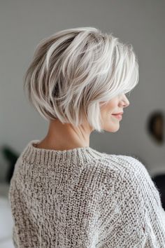 Click for More ➡️ | Save for Later ❤️  This short pixie bob combines edgy layers with a soft platinum hue. The layers give texture, while the platinum color adds a youthful glow, making it perfect for older women with fine hair looking for volume. (Textured Platinum Pixie Bob - Short Layered Bob Hairstyles For Older Women) Short Bob Grey Hair, Brown And White Hair Short, Short Blonde Bobs Fine Hair, Gray Bob Hairstyles Over 50, Medium Length Bob With Layers, Fine Flat Hair Haircuts, Gray Hair Bob, Silver Hair Bob, Impressive Hairstyles