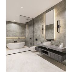 a large bathroom with two sinks, mirrors and a tub in the middle of it