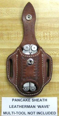 a brown leather case with two screws in it