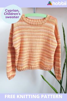 an orange and yellow sweater hanging on a clothes line with text overlay that reads, free knitting pattern