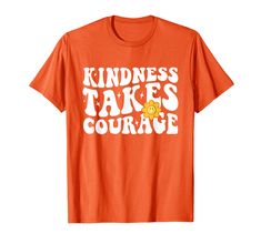 an orange shirt that says kindness takes courage