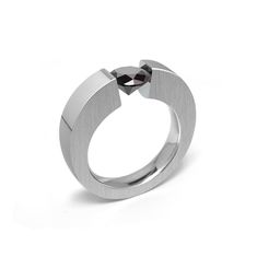 Strong and bold Unisex Tension Set ring with a radiant high quality round Black Diamond set in Stainless Steel. Ideal for men, but women love it too.This flowing quadrangular shaped ring from the Abbracci Collection  ‣ View Collection ABBRACCI https://etsy.me/2NrpPLQ ‣ View Matching band: https://etsy.me/3ZrlYPM Metal: 316 stainless steel, hypoallergenic and tarnish free. Mounting: 3mm thick on the side, tapering up to 6mm. comfort fit Gemstone: 6mm (approx. 1ct) * This item is Specifically crafted for you, will ship in 1 to 2 weeks - Free USA Shipping * NOTE: Prior placing the order, We strongly recommend having your ring finger sized by a professional jeweler. All errors on selecting a size may incur in resizing fees. Taurus Ring, Mens Initial Ring, Engraved Silver Ring, Black Sapphire Ring, Silver Cuff Ring, College Rings, Vintage Sapphire Ring, Full Finger Rings, Turquoise Statement Ring