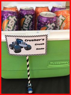 there is a cooler with some sodas in it and a sign that says crusher's crush soda