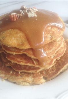 a stack of pancakes covered in caramel glaze