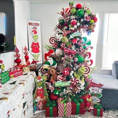 a christmas tree decorated with candy canes and ornaments