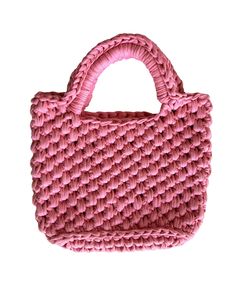 The cute, soft 'n chunky basket tote that fits all the essentials. Crocheted in NY using ethically manufactured yarn made entirely from repurposed textile waste. Unlined; flat bottom Materials: Yarn made from textile production remnants. Each bag diverts approximately 1lb of textile waste that would otherwise end up in a landfill. Measurements: 10" Width / 6.5" Height / 6" Strap drop Production: Crocheted by hand in NY by artisans who set their own rates Because the yarn used to construct this b Eco-friendly Pink Crochet Bag For Everyday, Eco-friendly Pink Crochet Bag, Pink Handwoven Bucket Bag For Everyday Use, Everyday Woven Yarn Bags, Eco-friendly Yarn Bag For Everyday Use, Eco-friendly Pink Handmade Crochet Bag, Casual Handmade Pink Bucket Bag, Eco-friendly Pink Crochet Woven Bag, Everyday Pink Woven Bucket Bag