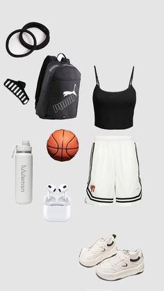 an assortment of sports gear including shoes, backpack and water bottle