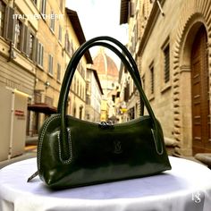 This bag has been made of the best genuine leather by local master crafters of Florence in Italy, designed for women who only accept premium Italian quality and luxury leather bags and modern Italian fashion. . Classic shoulder bag in shiny leather, with zip closure and inside pocket. Minimal and trendy. . Sizes: Width:   32 cm/12.6 inch Height:  13 cm/5.1inch Depth:    8 cm/3.1 inch . Weight: 0.5 kg The story of this bag :  One day, Maria decided to create a new collection of leather bags that would combine vintage and modern elements. She crafted a stunning shoulder leather bag, made of genuine Italian leather, with a classic and timeless design. This vintage leather bag quickly became a hit among women who wanted a daily leather bag that was both practical and stylish. The brown leather Leather Tote Bag Designer, Designer Laptop Bag, Natural Leather Bag, Leather Bags For Women, Handmade Leather Bags, Luxury Leather Bag, Timeless Bags, Italian Bags, Italian Leather Bags