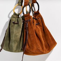 This Bag Is The Coolest Way To Carry It All. This Is A Bucket Bag Silhouette And Slouchy Design With Drawstring Closure. Chunky O Ring Detailing And A Single Shoulder Strap Fully Lined Height 13.8” Width 14.2” Shoulder Drop 17.7” Color: Brown Suede Hobo Bag, Bag Silhouette, Free People Bags, Yellow And Brown, Casablanca, Free Bag, O Ring, Hobo Bag, Bucket Bag