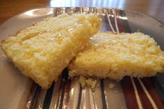 two pieces of cake sitting on top of a plate